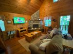 Livingroom with a Gas-Log Fireplace and a Flat Screen TV